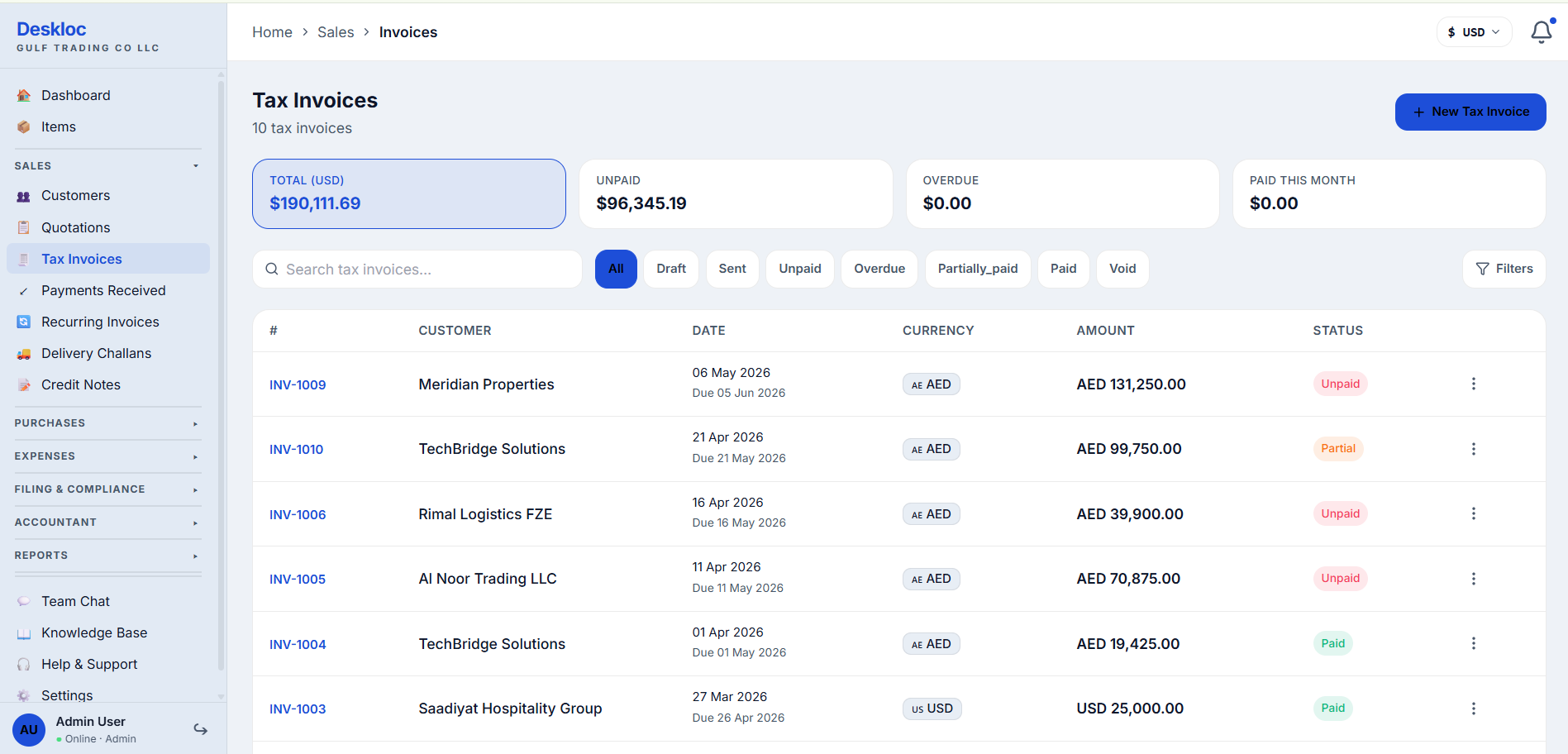 Tax Invoices list page showing existing invoices with status, currency, customer, and amount columns
